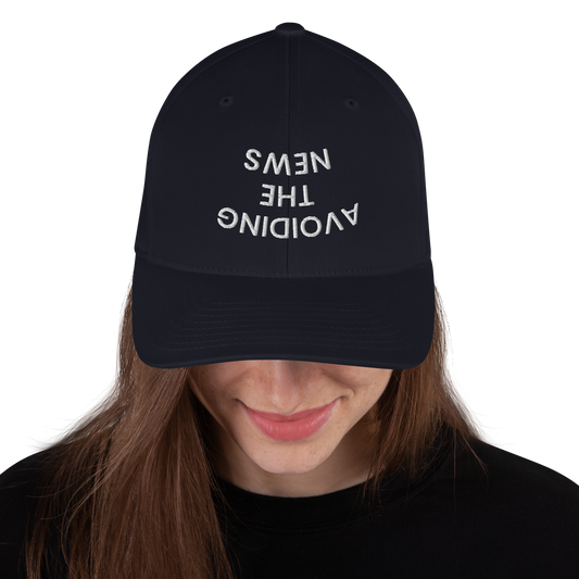 AVOIDING THE NEWS Structured Twill Cap.